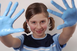 girl with paint on her hands