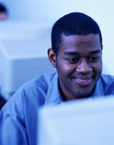 african american man at computer