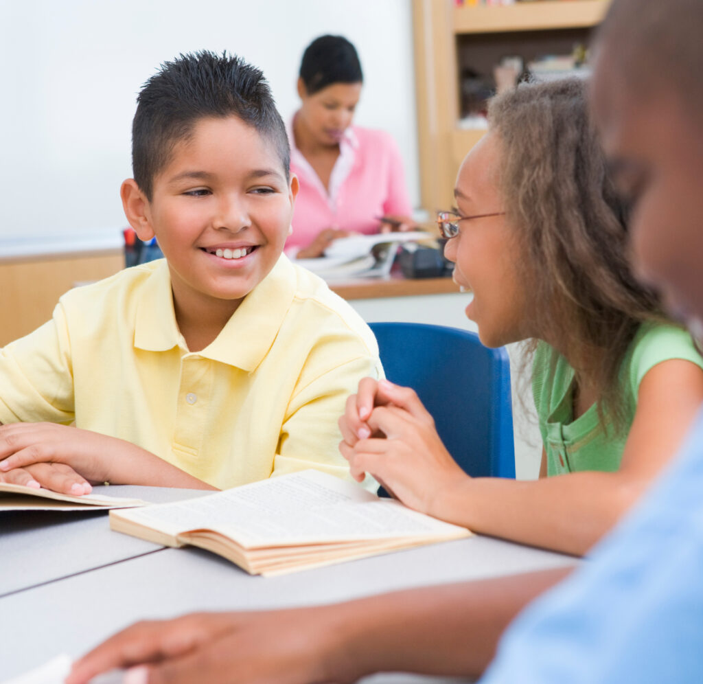 Co learning. A pupil reading book. Pupils reading books at School. Tailored Curriculum one student at a time.